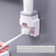Dispenser, toothpaste dispenser with holder for two toothbrushes, white