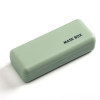 Container for storage of face mask, green